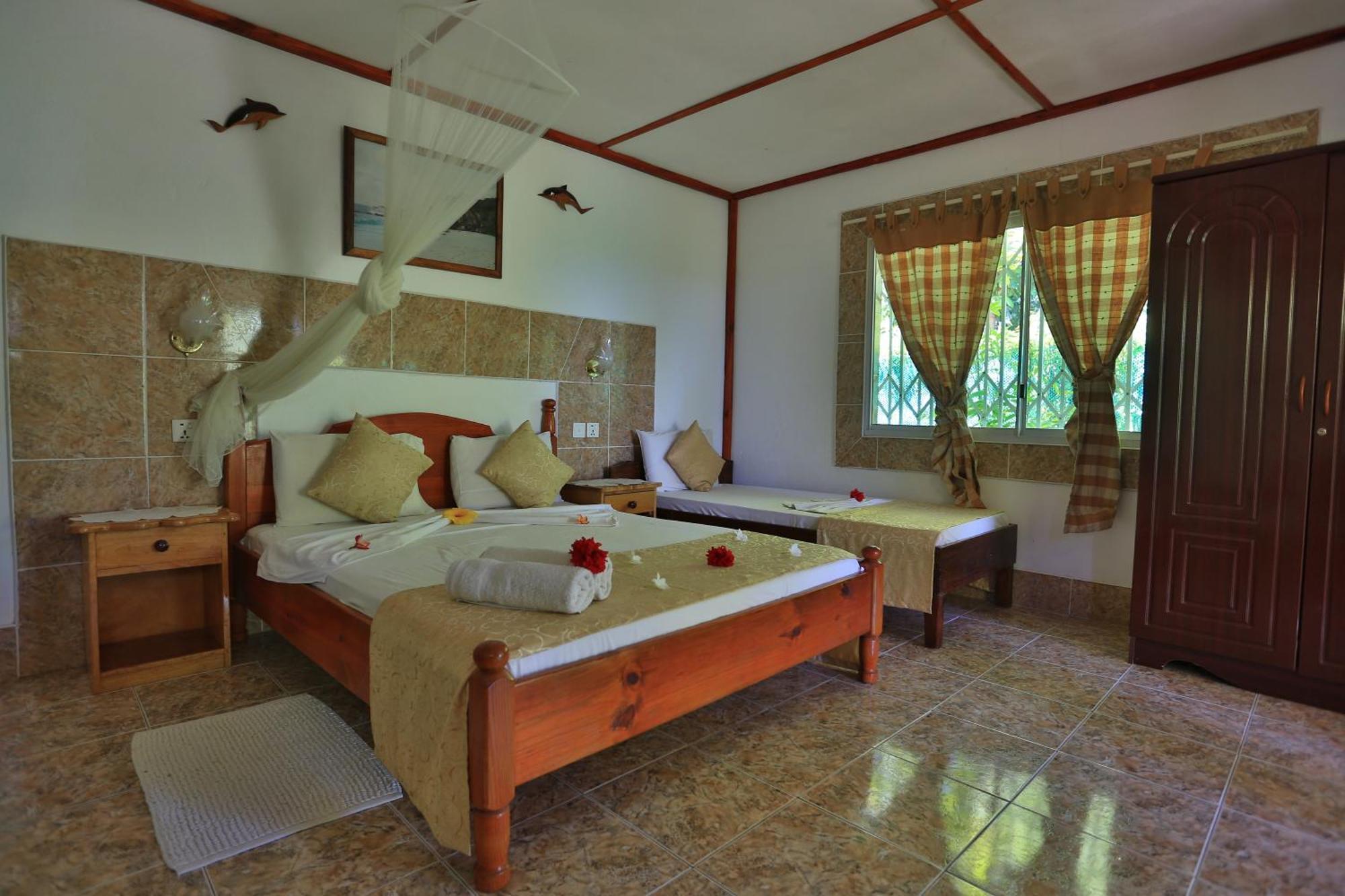 Rising Sun Guesthouse ラ・ディーグ島 部屋 写真
